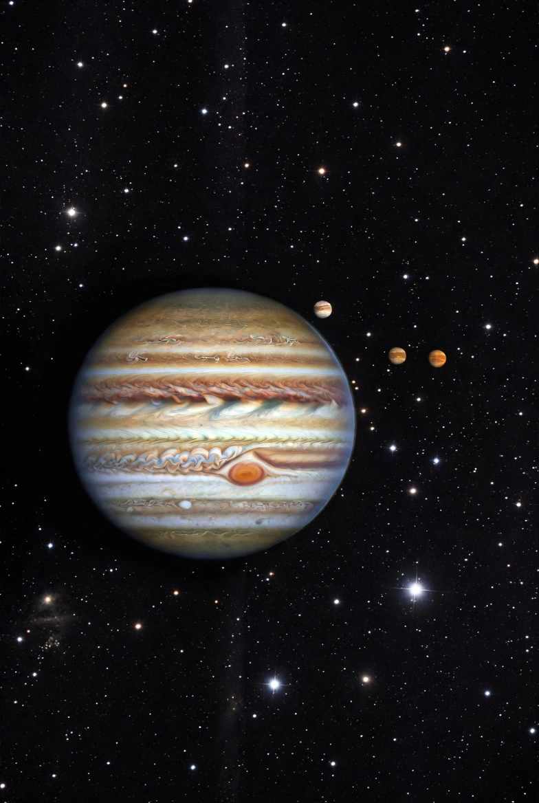 Artistic rendition of Jupiter with its largest moons visible against a starfield
